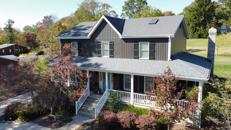 side view of home with new brown siding