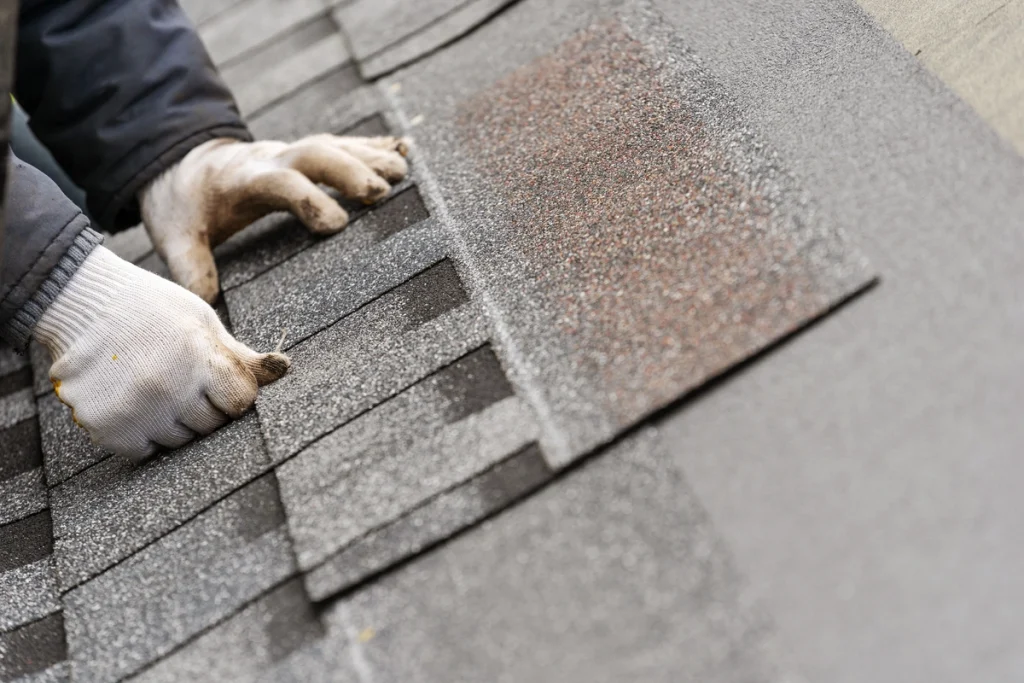 laying asphalt shingles