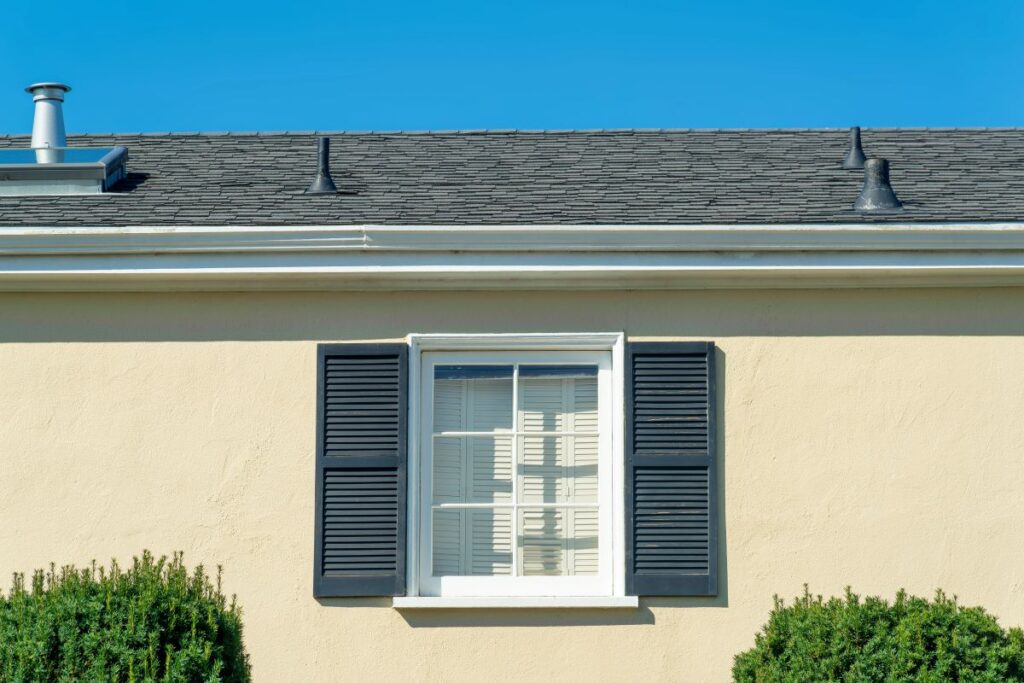 roof ventilation yellow wall old shingles roof
