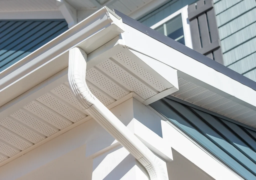 corner view of a white gutter system in Pittsburgh, PA