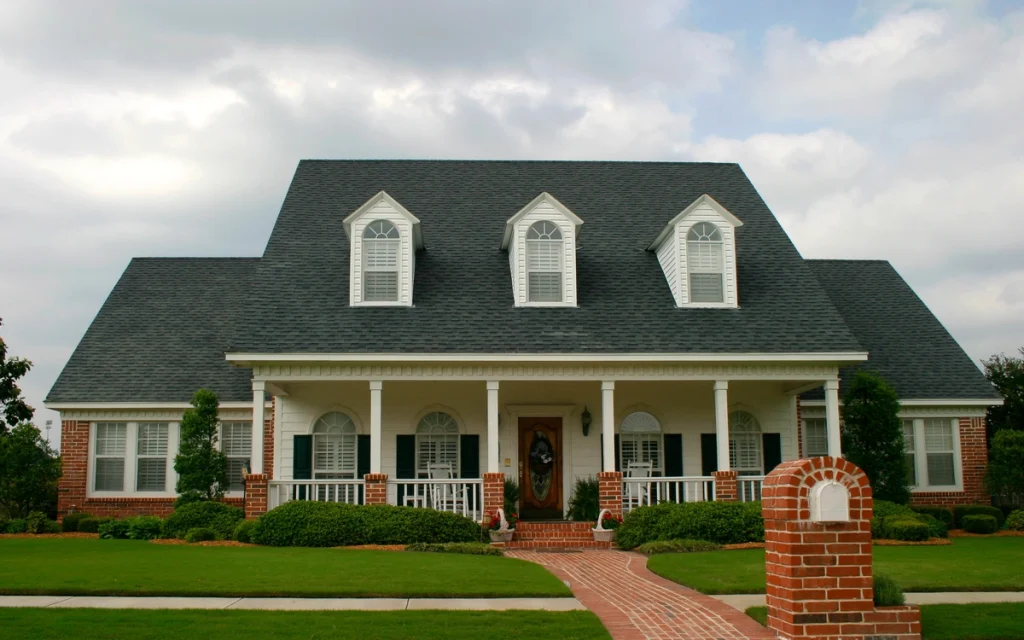 large shingle roof of classic style house exterior