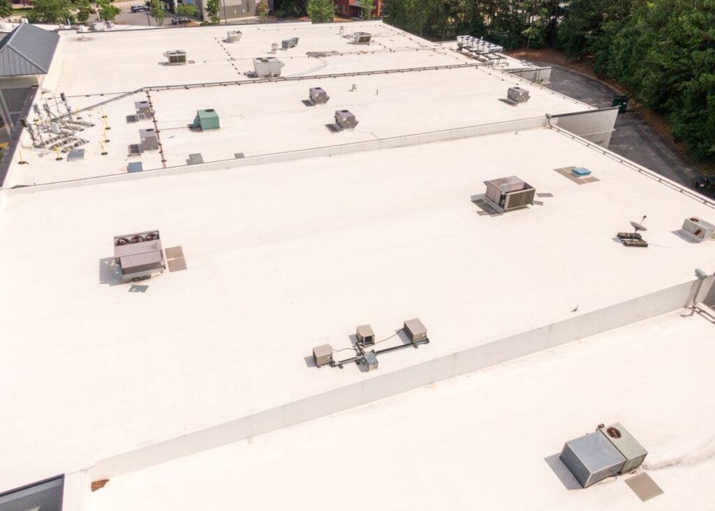 Sunny Daytime Drone Images of TPO Flat Roofs