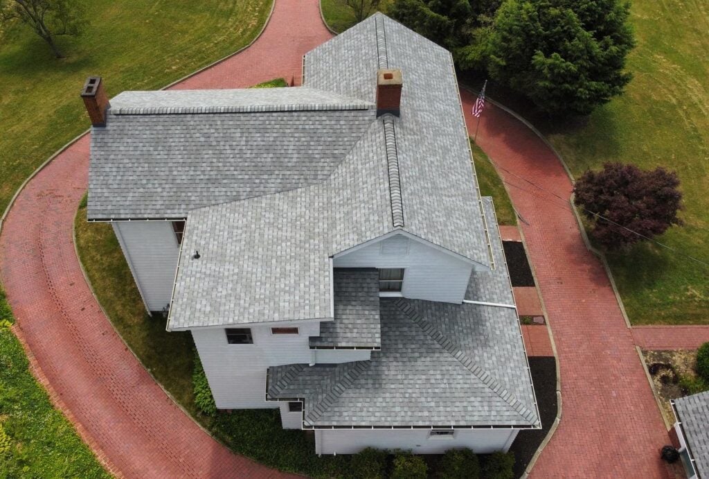 roofing companies in Allison Park McCormick project aerial view shingles roof big house