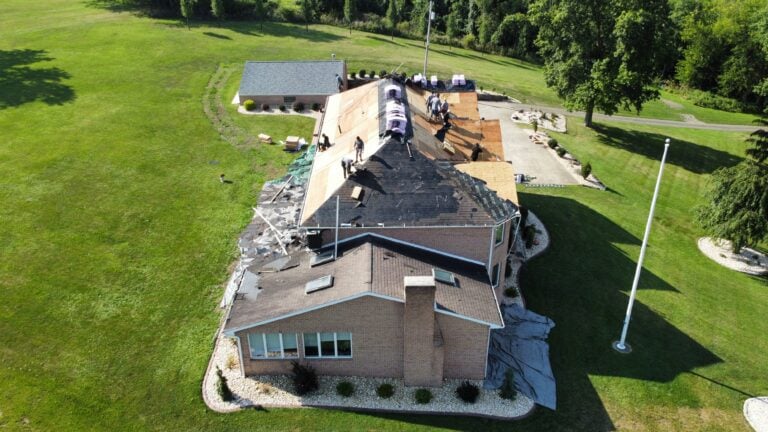 roof replacement cost Murrysville aerial view big house shingles replacement