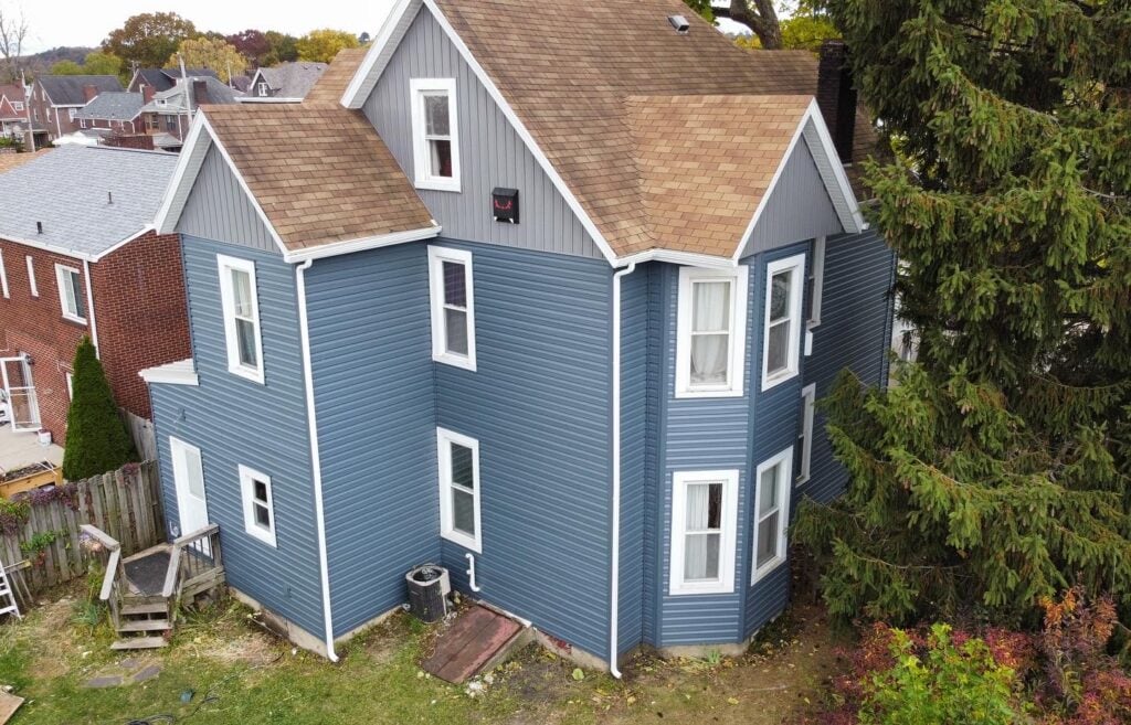 siding companies in Pittsburgh big blue house brown siding Mccormick project