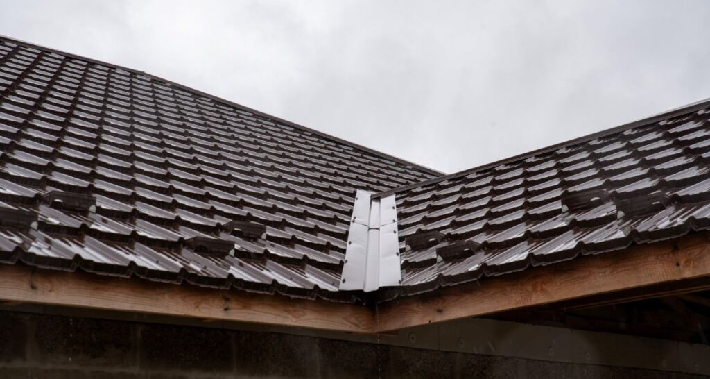 roof valley flashing metallic tiles close up