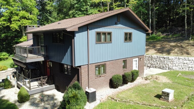 siding companies in Irwin light blue siding country house