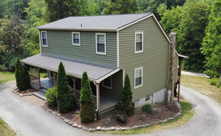 siding companies in Greensburg green house with grey shingles