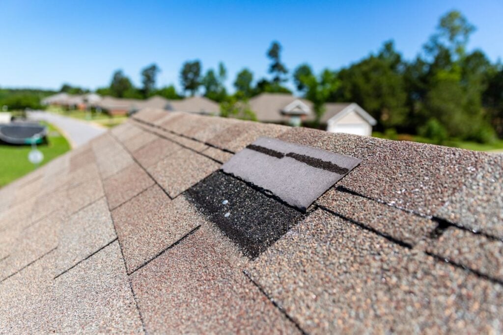 a missing shingle after storm damage