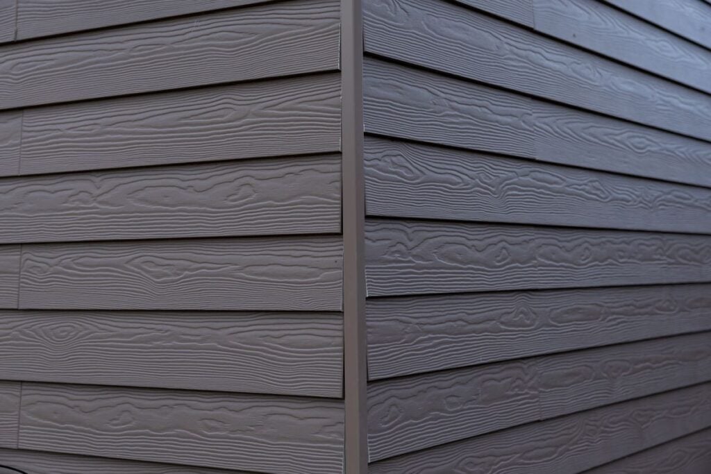 gray horizontal siding with a wood grain texture