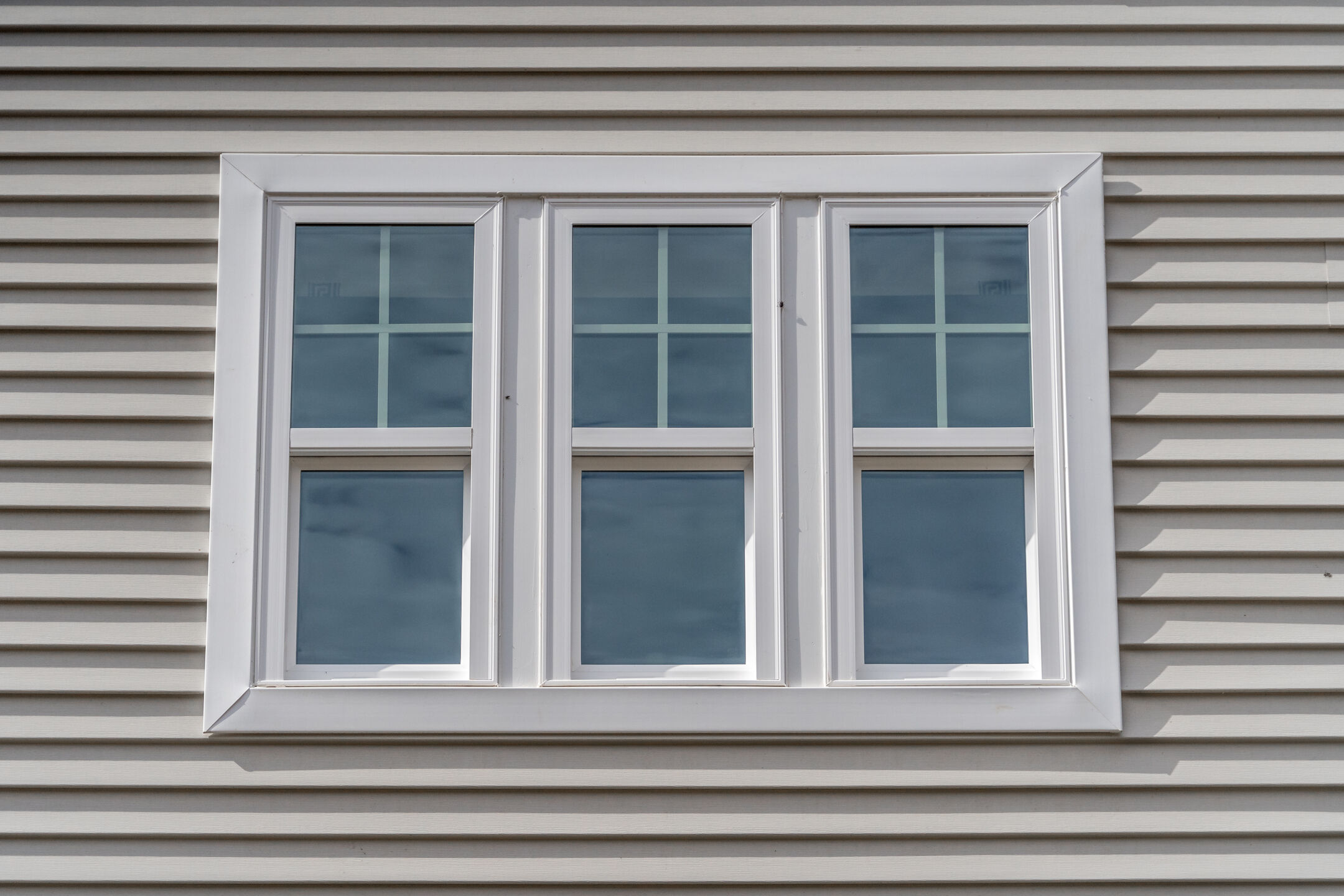 Triple hung casement window